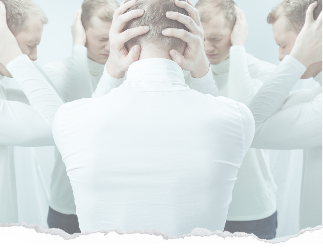 man in a white shirt depicting stress and suicide
