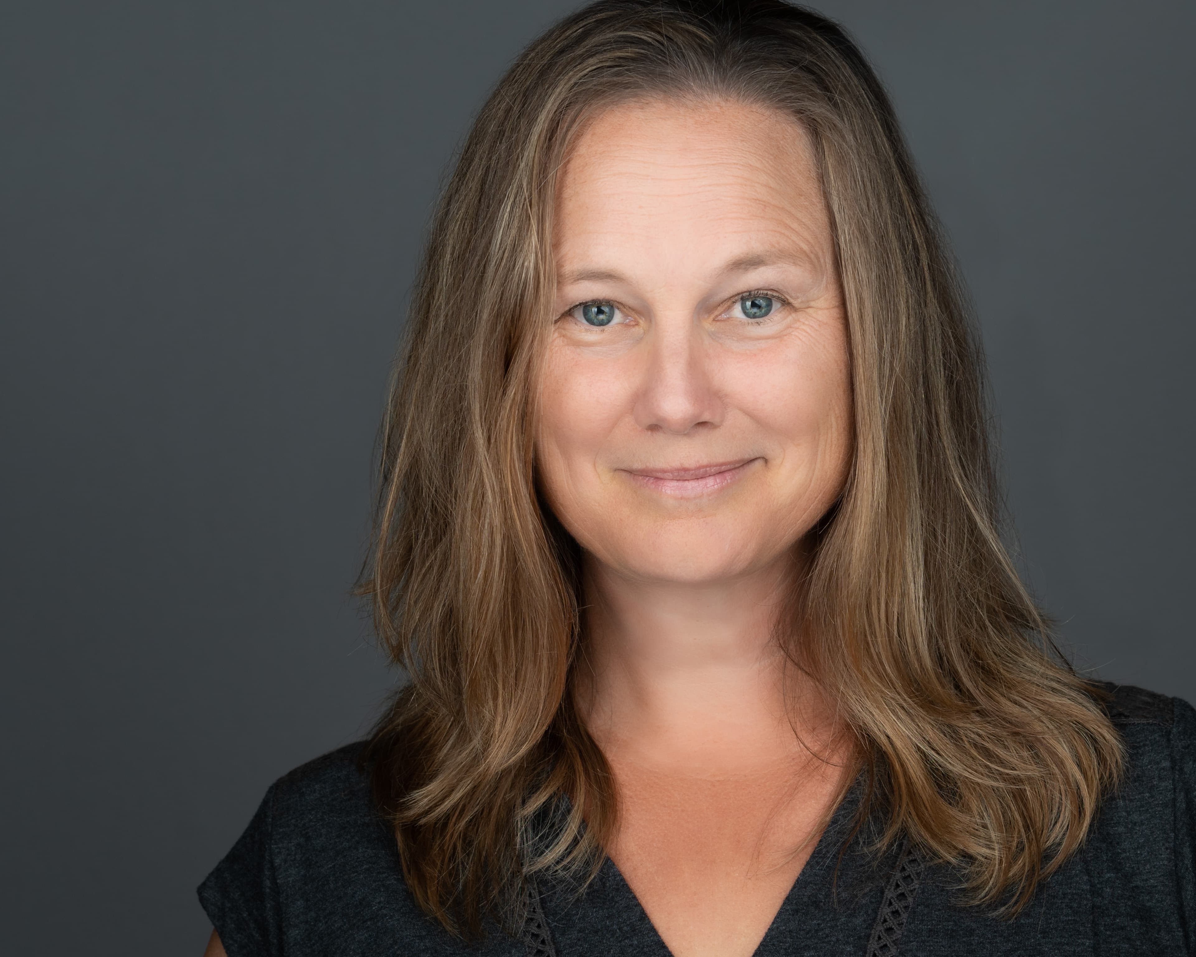 women on a gray background photography experience gift idea for someone who has everything