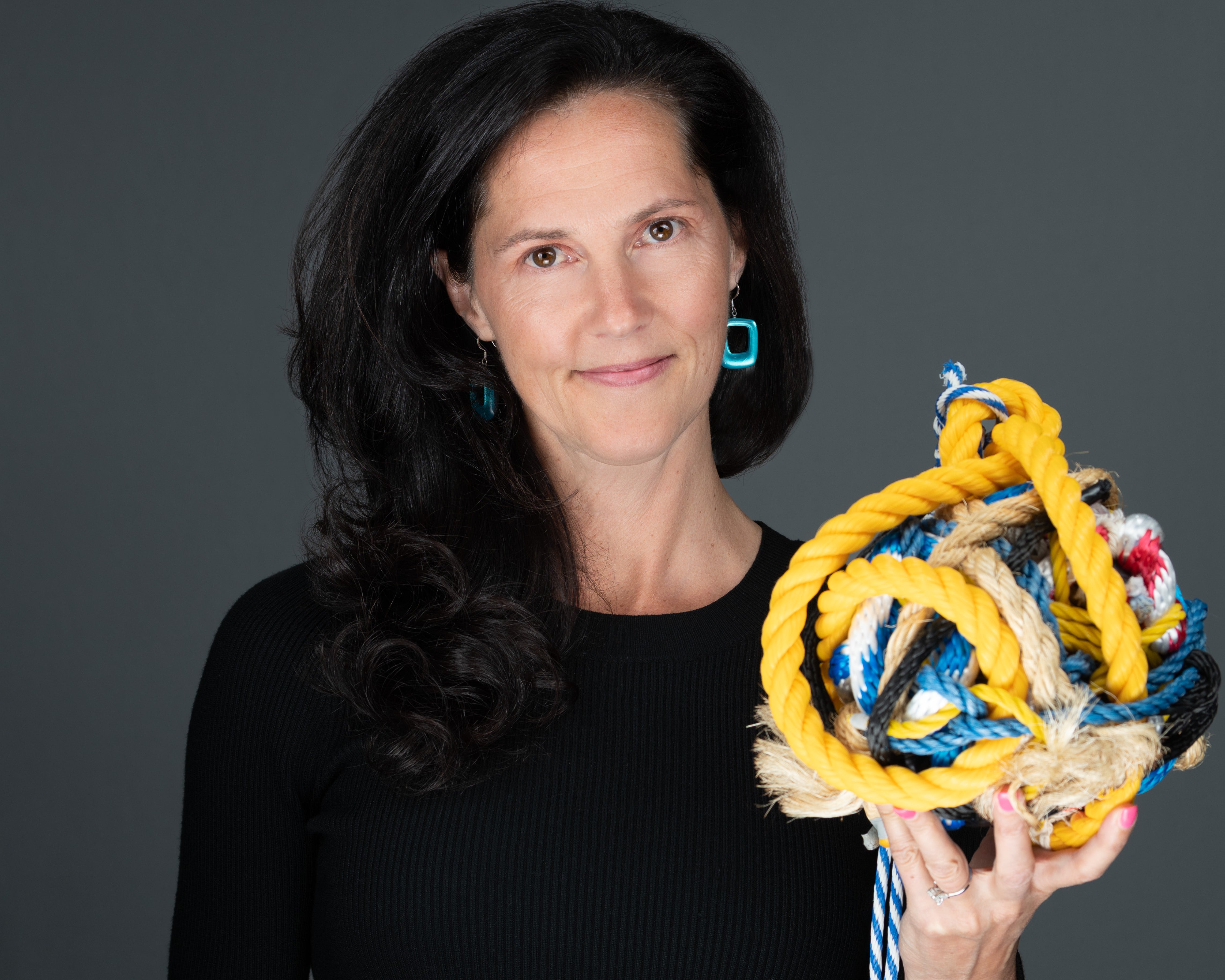 penny tremblay holding her tool