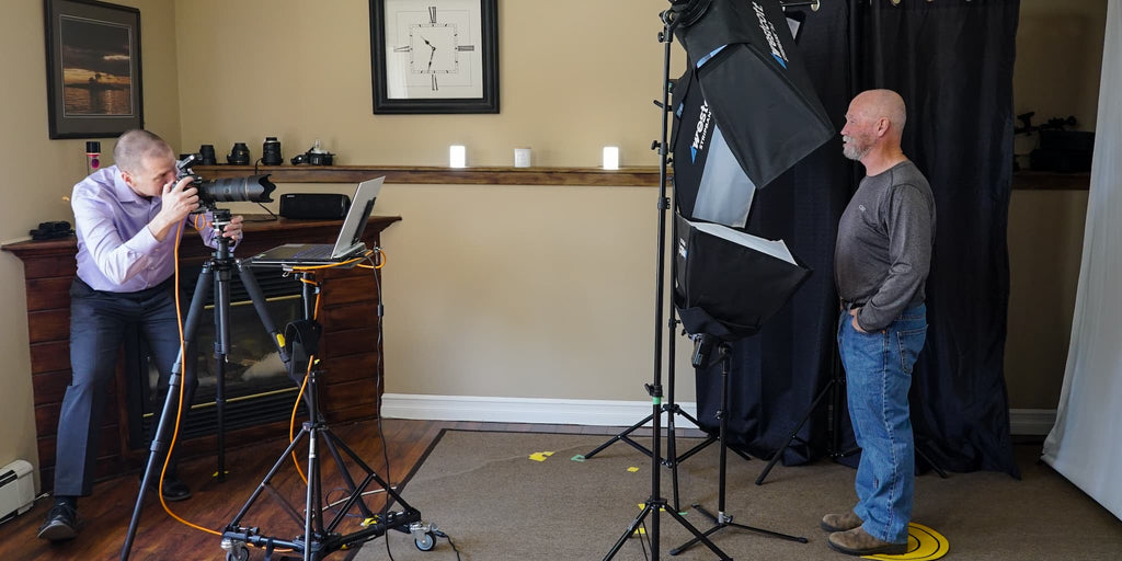 peter istvan taking a photo of a client in the studio